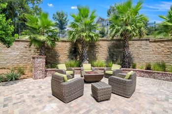 Poolside fire pit with lounge seating
